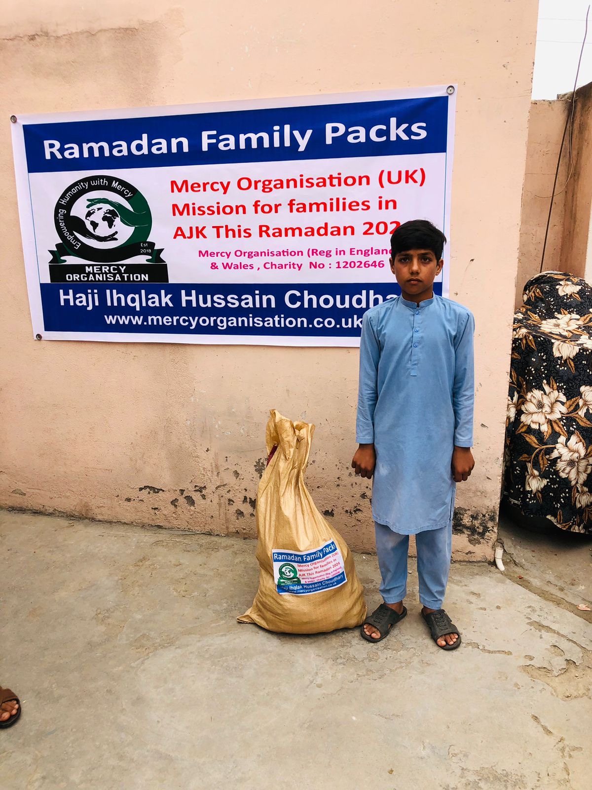 Ramadan 2024 family food packs being distributed in Azad Kashmir